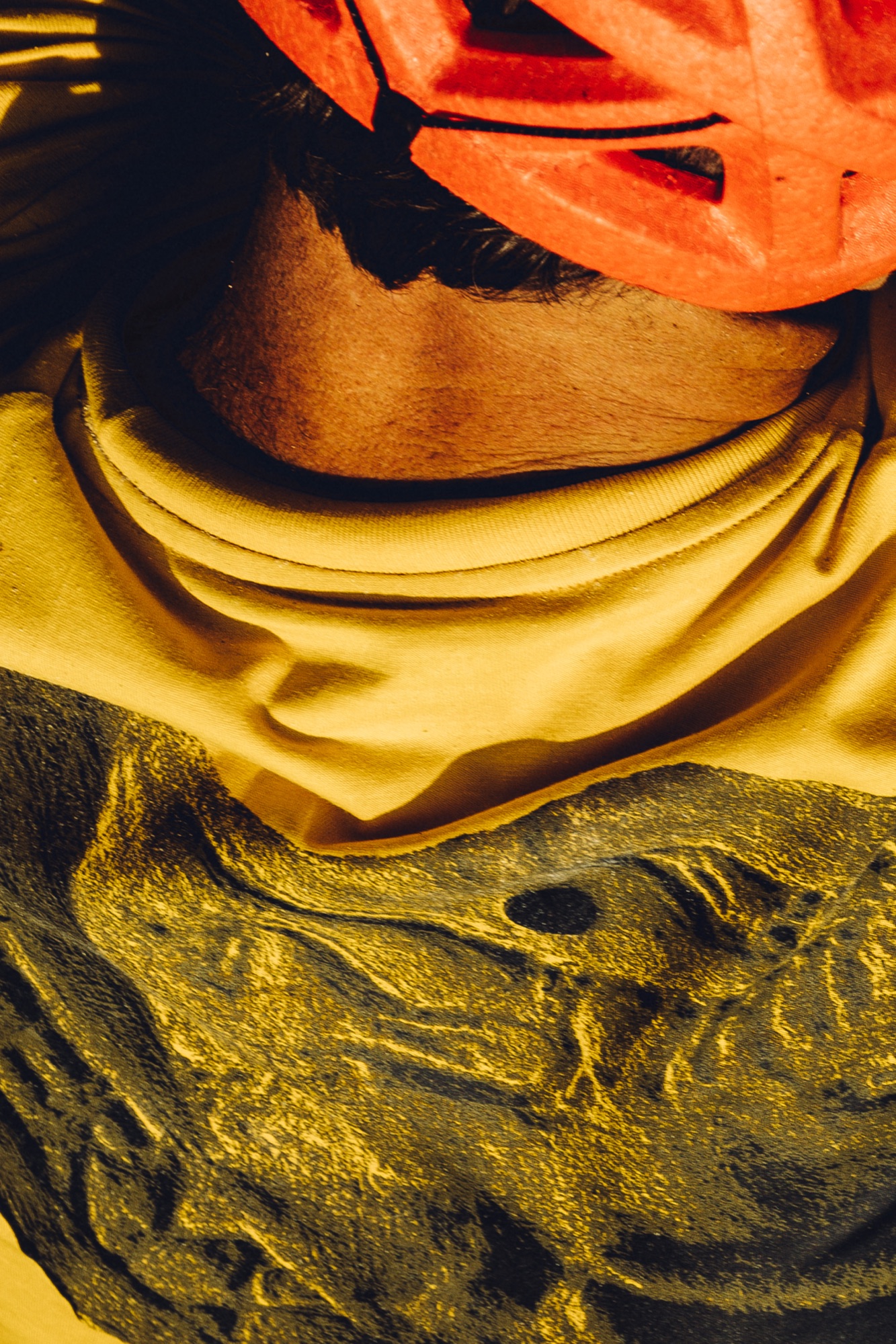 Close detail of a climber in a red helmet during the Arc’teryx ACA 2026 photography campaign